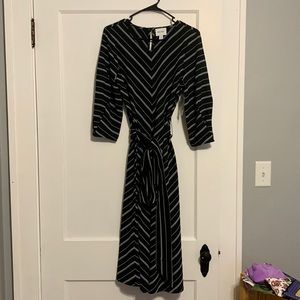 Striped black dress with pleated sleeves